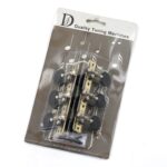 Empaque del clavijero negro envejecido para guitarra clásica con perillas negras.